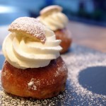 Enjoy a Semla at Aquavit, a sweet bun with almond cream traditionally eaten during Easter.